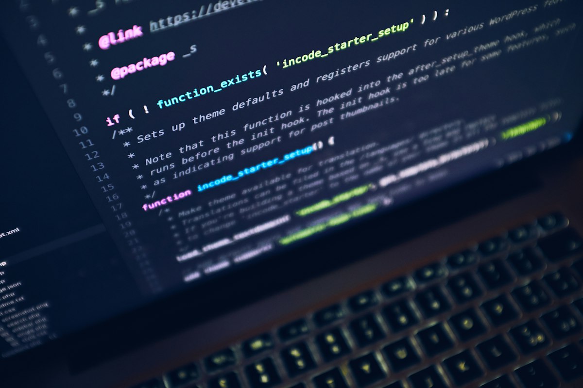 Close-up of code displayed on a laptop screen